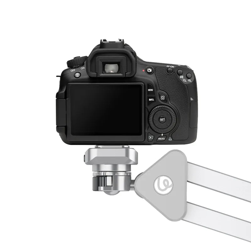 Camera with a mounted selfie stick on a white background