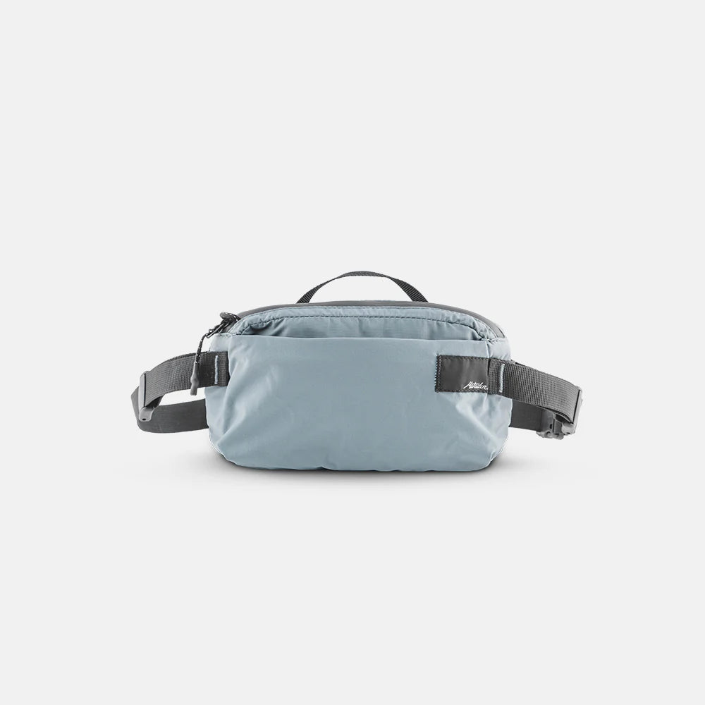 Blue Matador ReFraction Packable Sling on white background.