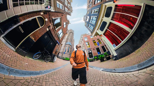 Person walking on a street with a fisheye lens effect