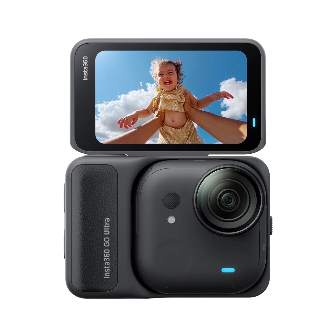 Action camera with a screen displaying a child in a yellow outfit against a blue sky.