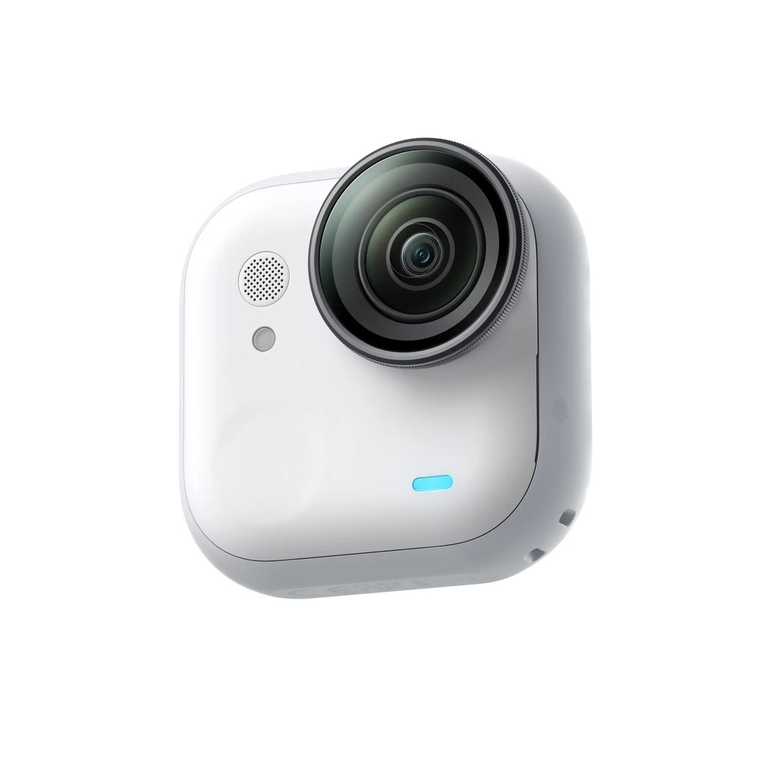 White camera with a circular lens on a white background