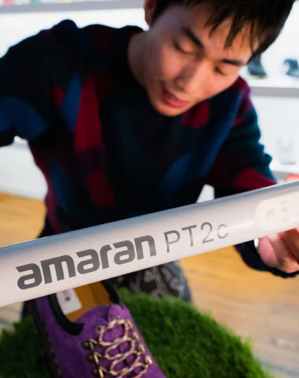 a man holding amaran PT2c