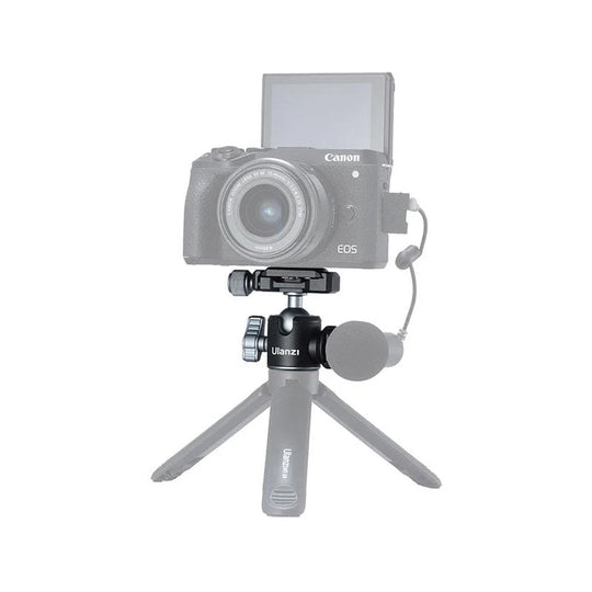 Canon camera with a Ulanzi mini tripod on a white background